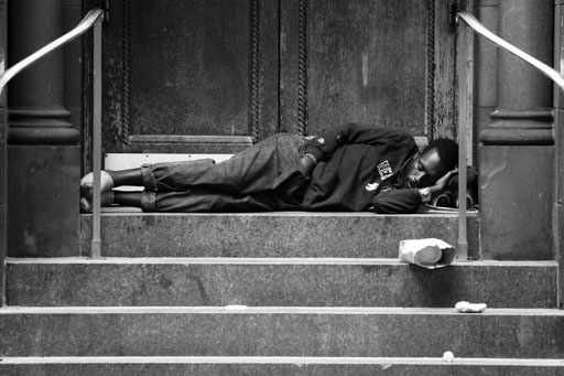man sleeping in vestibule