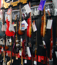 Image of many guitars