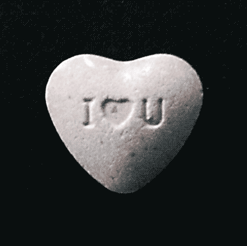 Candy hearts illustrate love and lust.