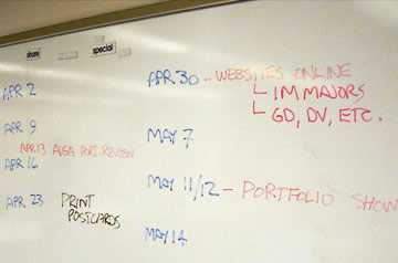 Whiteboard with dates until the end of the semester written on it.
