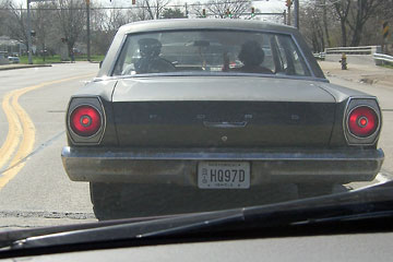 View of the back of an old (1960?) Ford