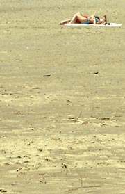 Sunbathers at Edgewater Park beach