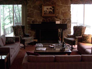 Our room showing fireplace and view to deck outside