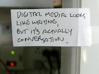 Handwritten note: Digital media looks like writing, but it's actually conversation.