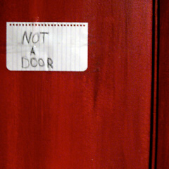 Handwritten sign saying "Not a door"