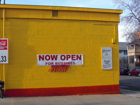 Bright yellow wall of gas station