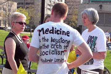 Tea Party protester wearing a T-shirt with fake Lenin quote