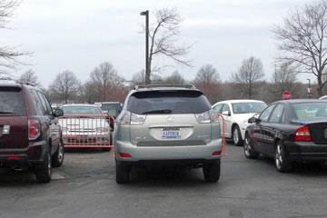 Cars parked in front of barriers