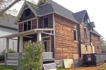 Next door house after siding was removed