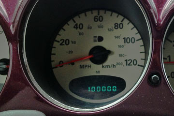 Odometer on Al's PT Cruiser showing 100,000 miles