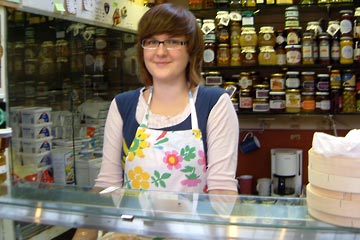 Heli, selling cheese at the market