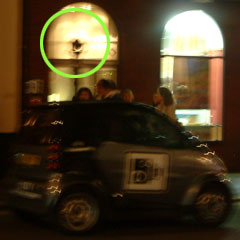 Car with CCTV camera on roof.