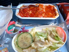 Dinner on the plane: lasagna and salad