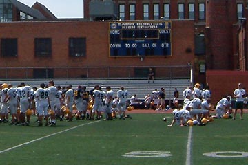 Football players practicing at St. Ignatius field