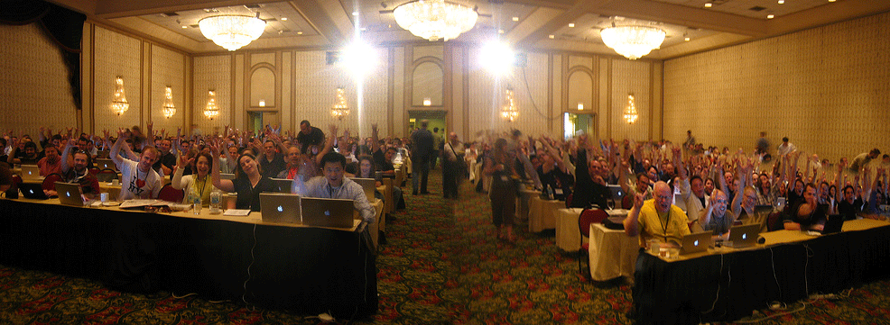 Animation of roomful of computer geeks raising hands in the air