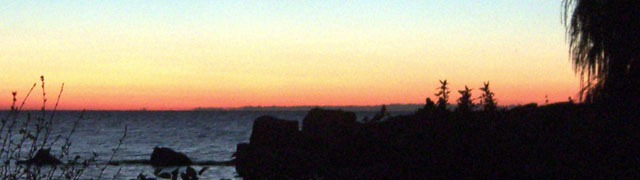 Glowing orange sky at the horizon over Lake Erie