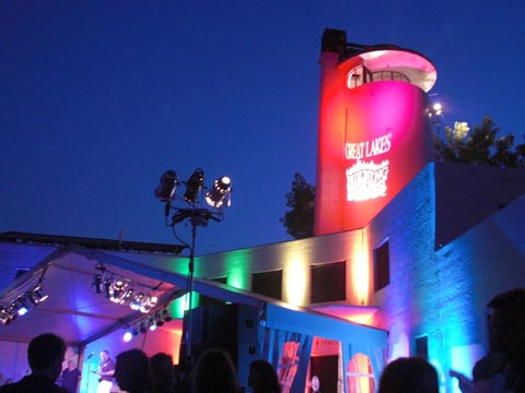 Cleveland Coast Guard station lit up with colorful spotlights