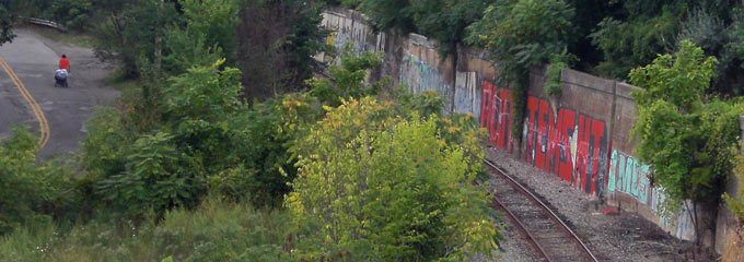 Looking down on Train Ave. with man walking