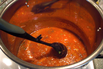 Tomatoes, peppers and basil in a bowl