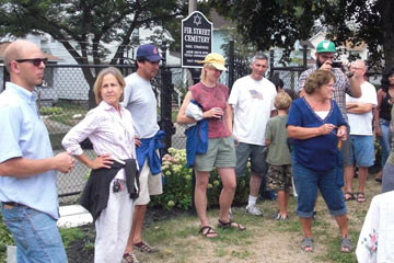 Group of people standing in Fir Street Cemetery