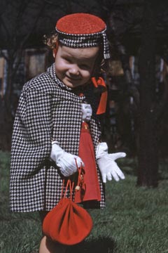 My sister Andrea as a little girl dressed in black and white outfit