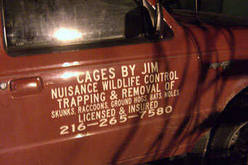 Red truck door with lettering on it