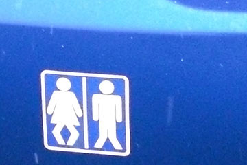 Bumper sticker of man/woman