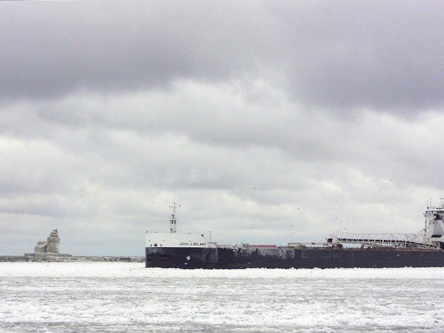 Freighter approaching ore docks, Cleveland, Ohio