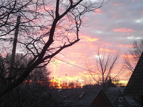 Pink and gold sunrise over the Near West Side