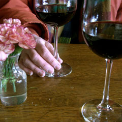 Wine and flowers on the table