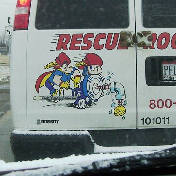 Back of truck with Rescue Rooter logo/mascot
