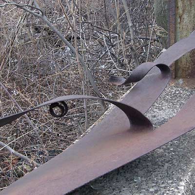 Torn rusted steel sheet