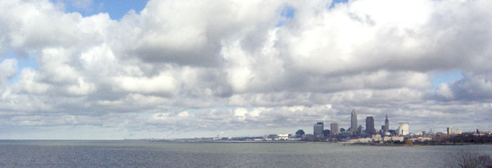 Cleveland skyline looking east with clouds and blue sky