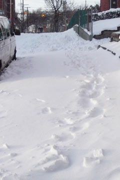 Snow not shoveled off walk