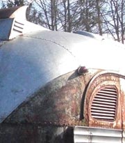 Two Flxible Clipper buses in junkyard