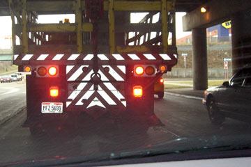 Rear view of truck with diagonal stripes.