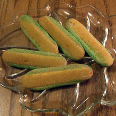 Yellow and green cookies shaped like ears of corn