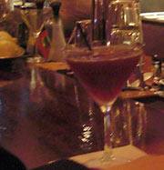 Glass on bar at Velvet Tango Room