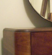 Round mirror on Art Moderne dresser