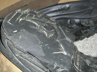 Close-up of worn-out boot heel