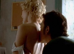 Scene from movie Never Forever with man kissing woman's back