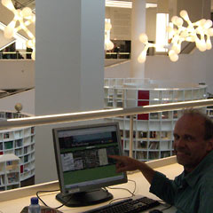 Al at computer terminal in library