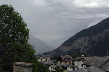 View of mountains near Salvan, with gray clouds all around