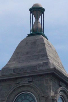 Stone hourglass atop Cudell clock tower