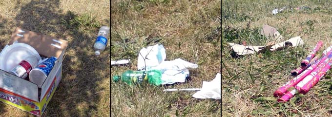 Trash strewn on grass at Edgewater Park