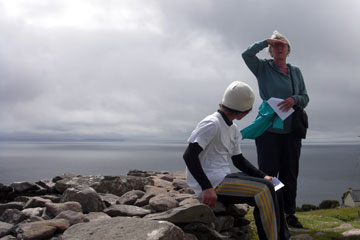 Joanne and X on a hill overlooking the sea