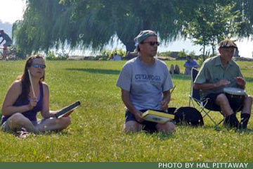 Al & two others drumming on grass