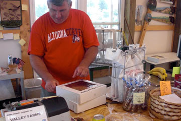 Clerk at Foote's ringing up my purchases