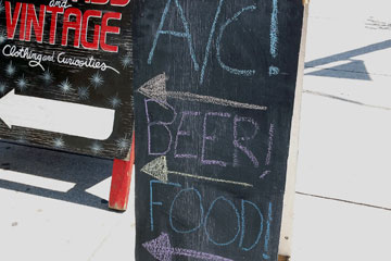 Chalkboard advertising food and beer