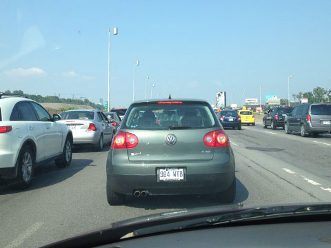 Five lanes of cars stopped in traffic